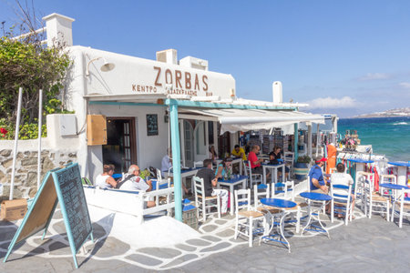 Mykonos, Greece - September 15th 2015: Zorba's restaurant overlooking the bay. The island is a popular holiday destination.のeditorial素材