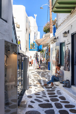 Mykonos, Greece - September 15th 2015: Typical narrow street in Chora. This is the main town on the island.のeditorial素材