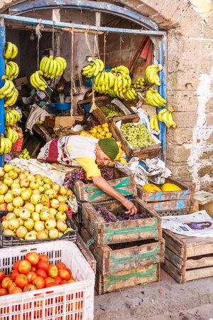 Essaouira, Morocco - September 14th 2010 : Vendor in fruit shop in the old town. The town is situated on the Atlantic coast.のeditorial素材