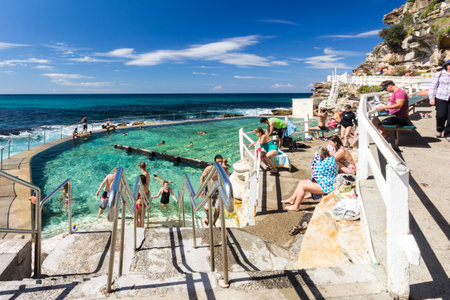 Sydney, Australia - April 2nd 2014: People swimming in Bronte baths. There are several sea water baths along this part of the coastのeditorial素材