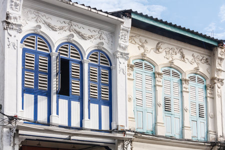Sino Portuguese architecture windows with shutters in Thalang Road, Old Phuket Town, Thailandのeditorial素材
