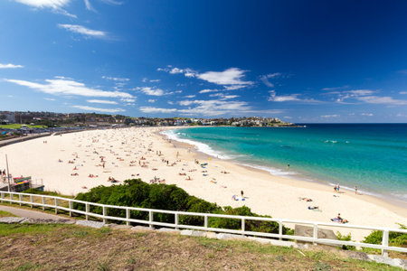 Sydney, Australia - April 2nd 2014: People enjoying Bondi beach on a hot sunny day, This is Australias most famous beach.のeditorial素材