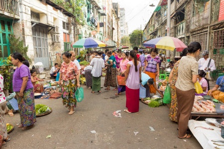 Yangon, Myanmar-May 8th 2014: A buy street market. Street markets are found all over the city.のeditorial素材