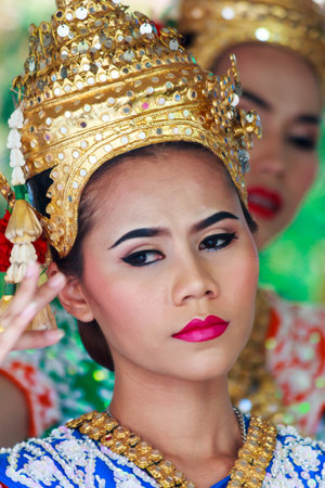 Bangkok, Thailand - September 27th 2014: Beautiful dancer at the Erawan shrine. People pay to have...