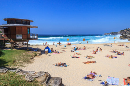 Sydney, Australia - March 16th 2013: People enjoying the good weather on Tamarama beach. The beach is on the Coogee to Bondi coastal walk.のeditorial素材