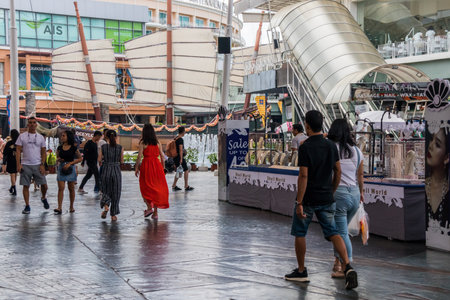Patong, Phuket, Thailand - January 17th 2019: Tourists walking through Jung Ceylon shopping mall. The centre is the major shopping area.のeditorial素材