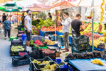 Alacati, Turkey - September 7th 2019: Fruit stall on the  market. The market is held every Saturday.のeditorial素材