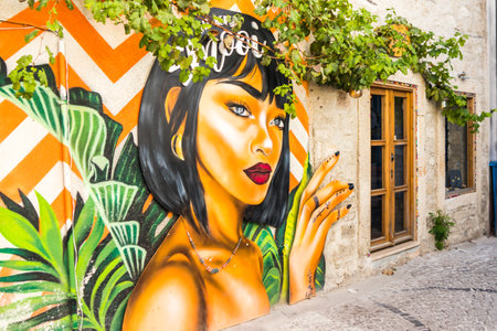 Alacati, Turkey - September 7th 2019: Wall mural on side of a building. The town is popular with tourists in summerのeditorial素材