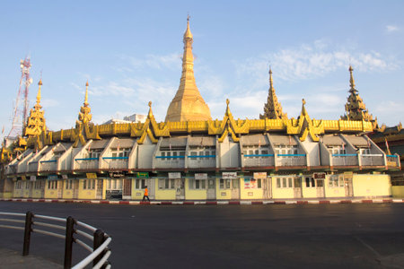 Yangon, Myanmar-May 8th 2014: Sule Pagoda bathed in early morning sunshine. The pagoda is considered to be the centre of Yangon from where distances to other places are measured.のeditorial素材