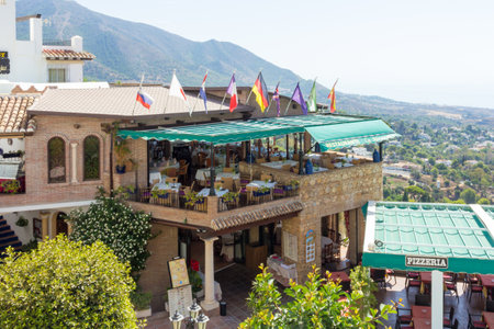 Mijas, Spain - August 27th 2015: Clifftop restaurant. The town is a popular expat and tourist destination.のeditorial素材