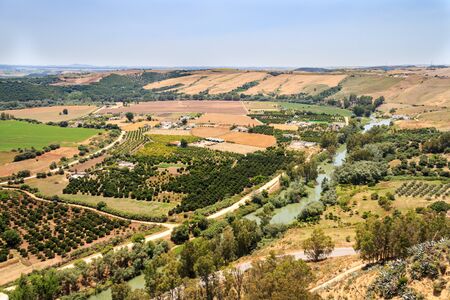 View over Guadalete river and surrounding countryside from New Pena Balcony, Arcos de la Frontera, Cadiz Province, Spainの写真素材