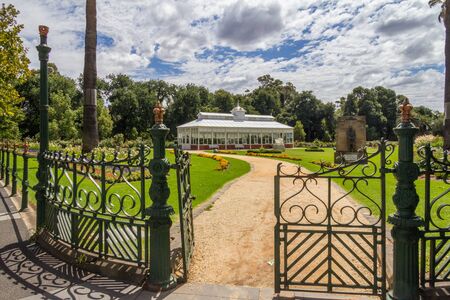 Open gate and path leading to the conservatory, Conservatory Gardens, Bendigo, Victoria, Australiaの写真素材