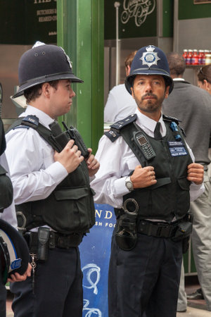 London, England - September 4th 2010: Policemen on duty at Borough Market, Southwark. Foot patrol...