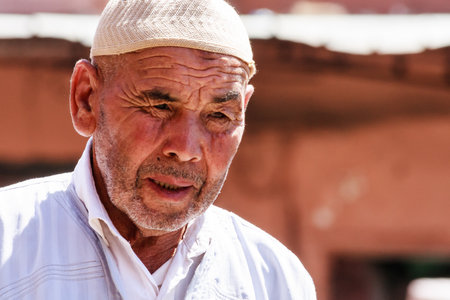 Marrakech, Morocco - September 9th 2010: Portrait of a Moroccan man wearing a hat. Long robes and a hat are the standard dress for men.のeditorial素材