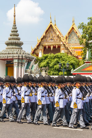 Bangkok, Thailand April 9th 2012: Thai soldiers in white uniforms on parade outside the Grand Palace. Each regiment has its own colour for ceremonial dress.のeditorial素材