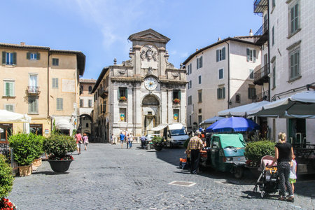 Spoleto, Italy - 2nd August 2016:  The town hall building with clock. The building dates from the 17th century.のeditorial素材