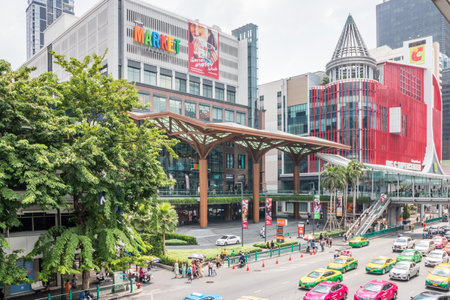 Bangkok, Thailand - October 23rd 2019: Traffic flowing past the Market shopping mall and Big C supercenter. This is the Ratchaprasong area.のeditorial素材