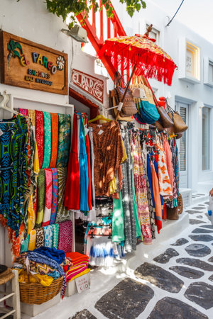 Mykonos, Greece - September 15th 2015: Shop in a typical street in Chora. . The island is a popular tourist destination.のeditorial素材