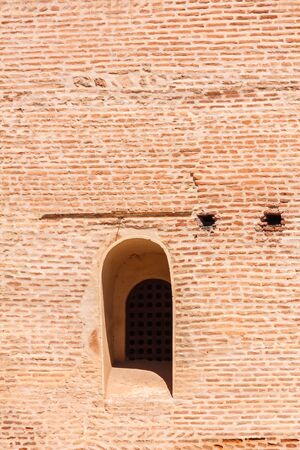 Window in brick wall in Marrakesh, Moroccoの写真素材