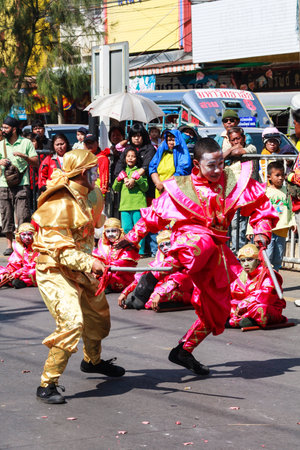 Khon Kaen - November 21st 2009: Chinese warrior dancers at the Silk Festival. It is an annual event.のeditorial素材