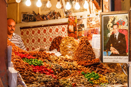 Marrakesh, Morocco - September 8th 2010: Shop selling sweet pastries in the souk. The souk has hundreds of shops.のeditorial素材