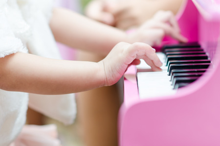 Child play pianoの写真素材