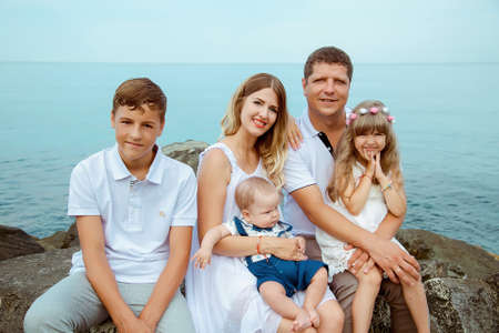 family vacation in summer, on a wild beachのeditorial素材