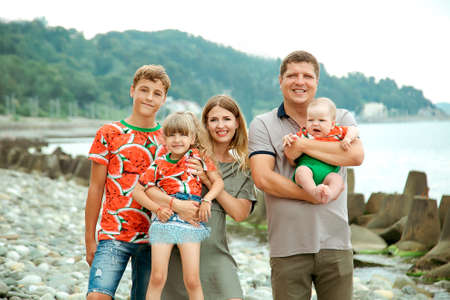 family vacation in summer, on a wild beachのeditorial素材