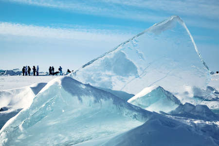 natural background, texture, winter landscape, large blocks of ice with clear blue snow