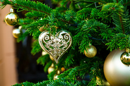 Beautiful,shiny,festive toys on the Christmas tree on New Year's Eve,close-upの写真素材