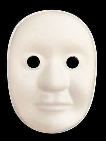 Plain white mask with a dark backgroundの写真素材