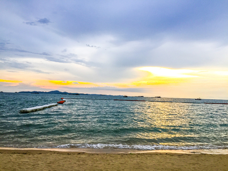 Beach and sea sunsetの写真素材
