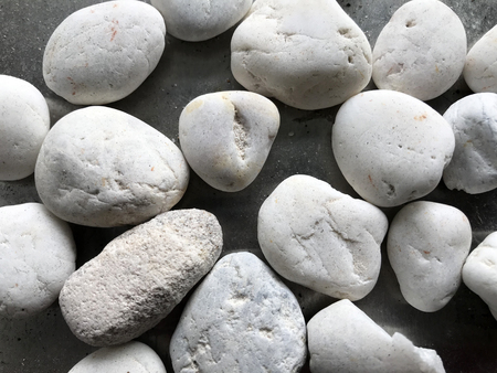 Close up round stone on a black backgroundの写真素材