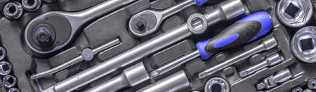 men tools background. Worker tools and equipment close-up. A set of wrenches and screwdrivers are...