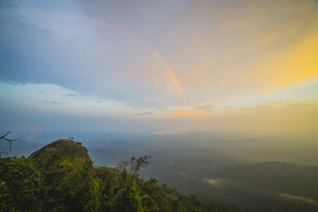 Sunset Over Mountain with Rain Forestの写真素材