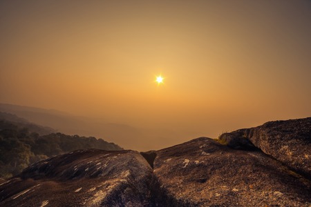 sunset behind mountainsの写真素材