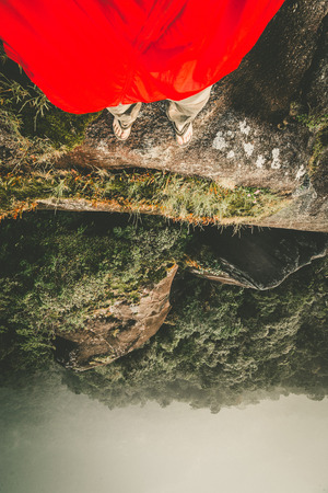Standing on cliffの写真素材