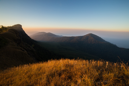 Mountain field during sunset. Beautiful natural landscapeの写真素材