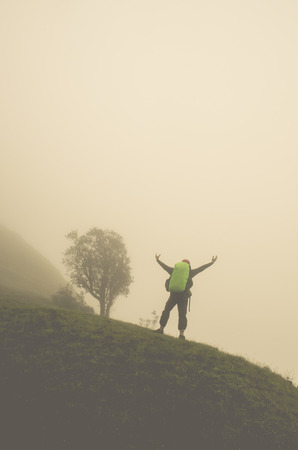 Man standing in the fogの写真素材