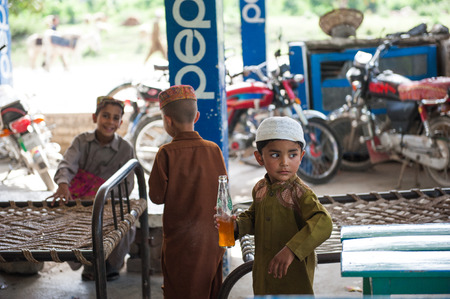 HUNZA, PAKISTAN - APRIL 15: An unidentified Children in a village of the Hunza, April 15, 2015 in Hunza, Pakistan with a population of more than 150 million people.のeditorial素材