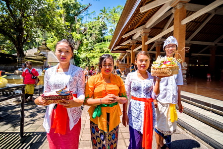 BALI, INDONESIA-AUGUST 13 : People go down after praying in Besakih temple on August 13, 2016 in Bali, Indonesia. Besakih temple is one of the most famous hindu temple in Bali islandのeditorial素材
