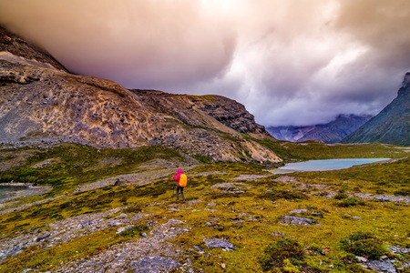 travel with snow mountain and lake background in yading china.の写真素材