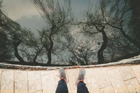A view of the river Prut with tree pair of legs