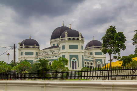 MEDAN, INDONESIA - SEPTEMBER 19,2017 : Great Mosque of Medan or Masjid Raya Al Mashun is a mosque located in Medan, Indonesia. The mosque was built in the year 1906 and completed in 1909 and one of the largest mosques in Medanのeditorial素材