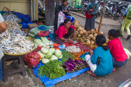 MEDAN, INDONESIA - SEPTEMBER 16,2017 : The Villagers bring vegetables and fruits and so on. Sold in the bazaar in medan, Indonesiaの写真素材