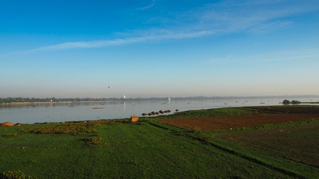 Life of fisherman and farmer at river side in Mandalay, Myanmar with wonderful sun light at morningの写真素材