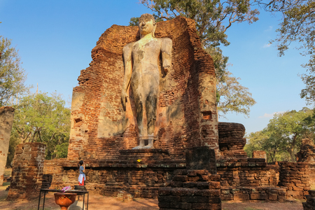 Old Buddha statue in Wat Phra Si Iriyabot in the Kamphaeng Phet Historical Park, Thailand.の写真素材