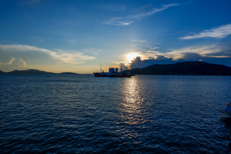 fishing boat at songkla lake when sunset timeの写真素材
