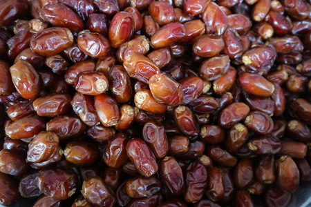 Khalas date palm in top view flat lay with close up viewの写真素材