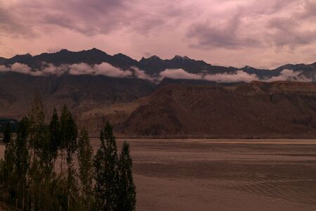 landscape view of the Indus river flowing through Katpana cold desert in Skardu, Gilgit Baltistan, Pakistan.の写真素材